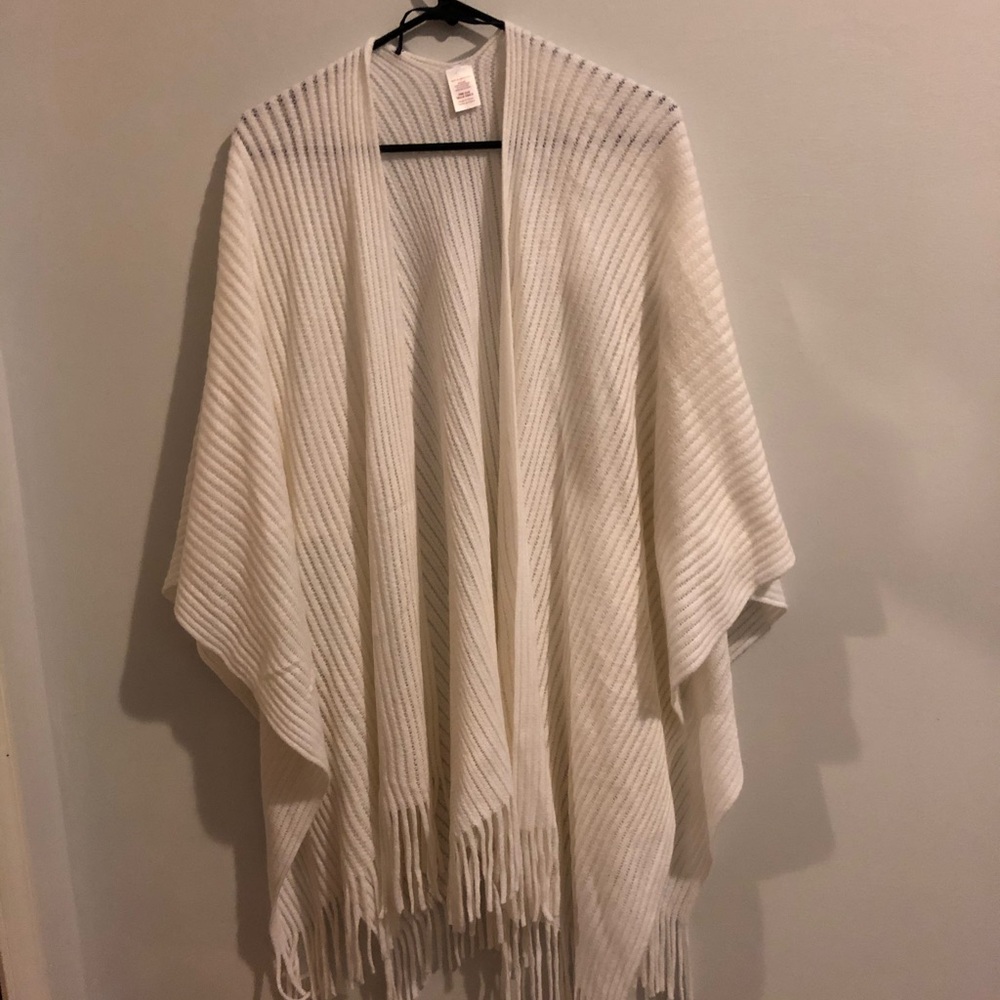 A white fringed cardigan